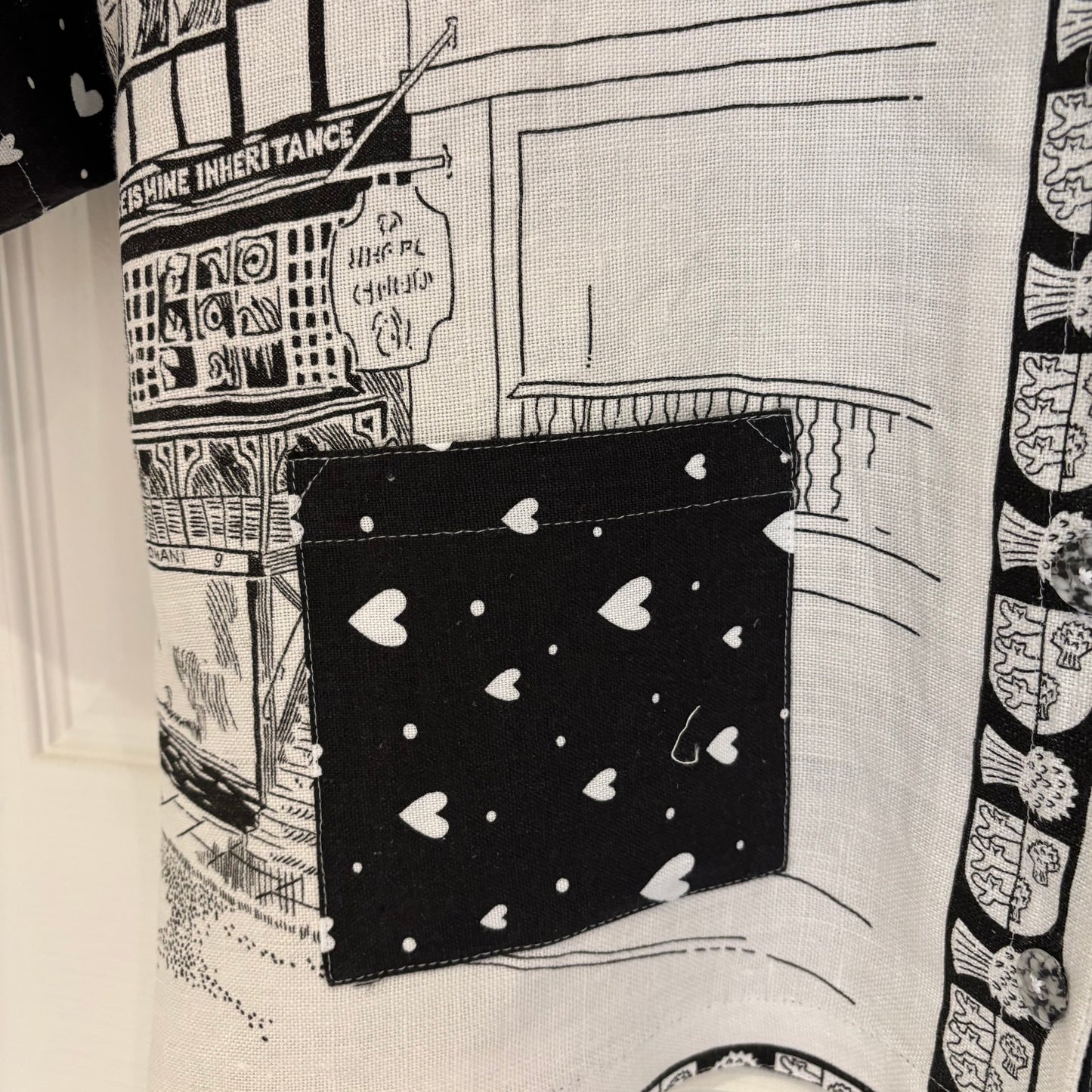 The black and white collarless tea-shirt