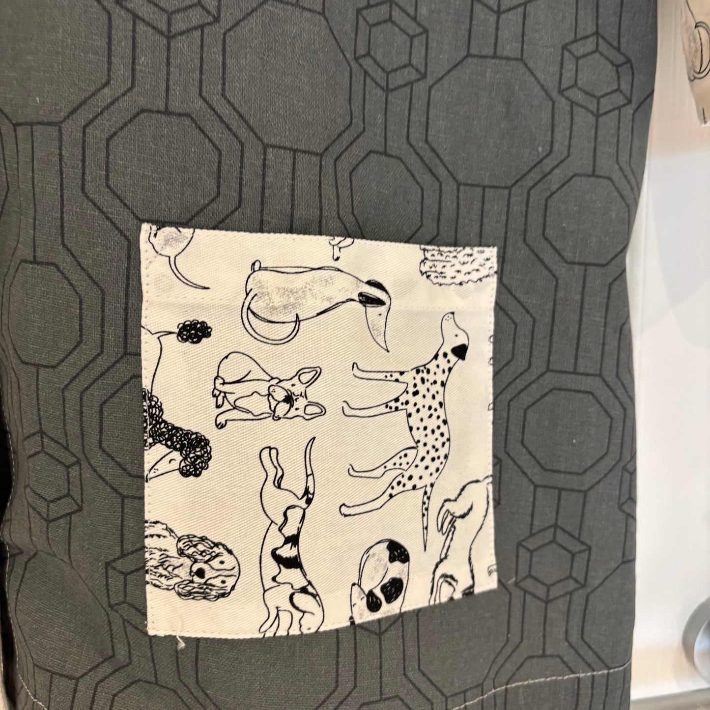 The black and white collarless tea-shirt